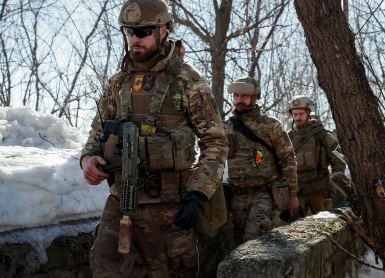 Azov Battalion fighters are seen at a frontline position in eastern Ukraine in February, 2019