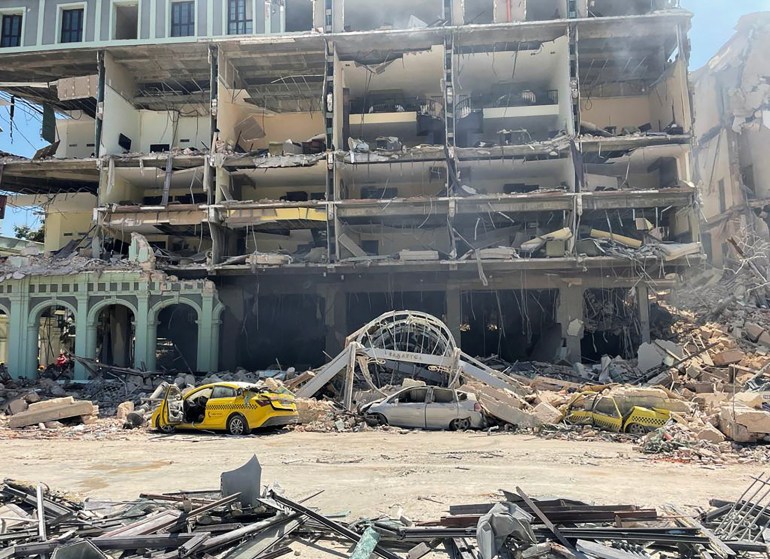debris is scattered after explosion at hotel in Havana