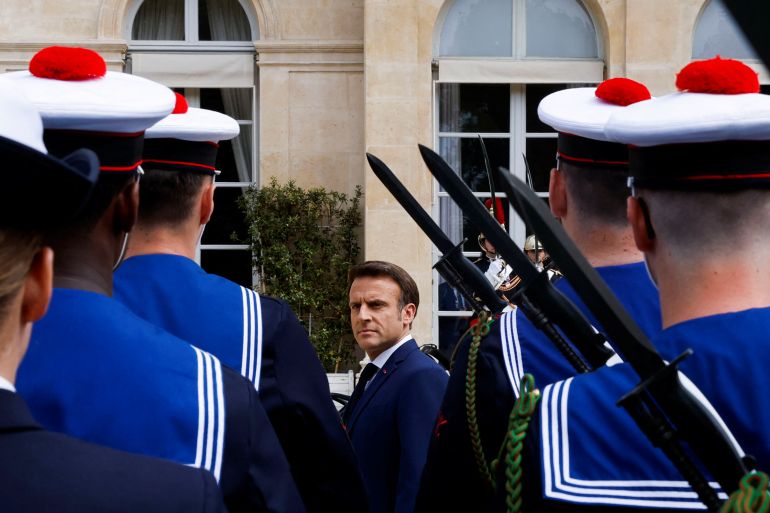 French President Macron reviews the troops during his swearing-in ceremony for a second term as president