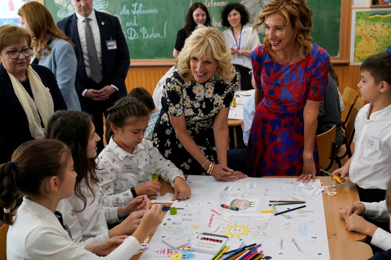 U.S. first lady Jill Biden and Romania's first lady Carmen Johannis visit the Scoala Gimnaziala Uruguay, or Uruguay School, in Bucharest, Romania
