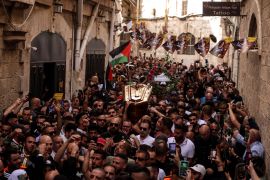 Family and friends carry the coffin of Al Jazeera reporter Shireen Abu Akleh, who was killed during an Israeli raid in Jenin in the occupied West Bank [Ammar Awad/Reuters]