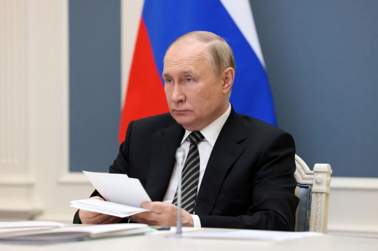 Russian President Vladimir Putin attends a meeting of the Supreme Eurasian Economic Council in Moscow