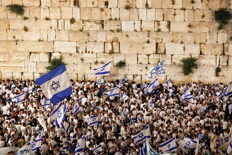 Israelis celebrate Jerusalem Day by the Western Wall, Judaism's holiest prayer site, in Jerusalem's old city 