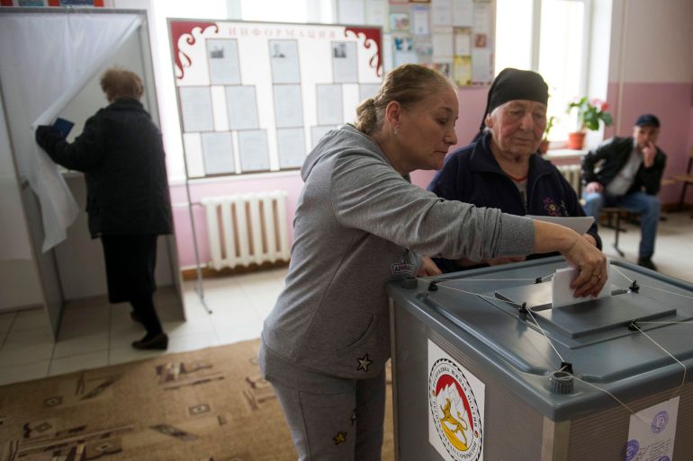 Ossetian women cast their ballot during presidential elections