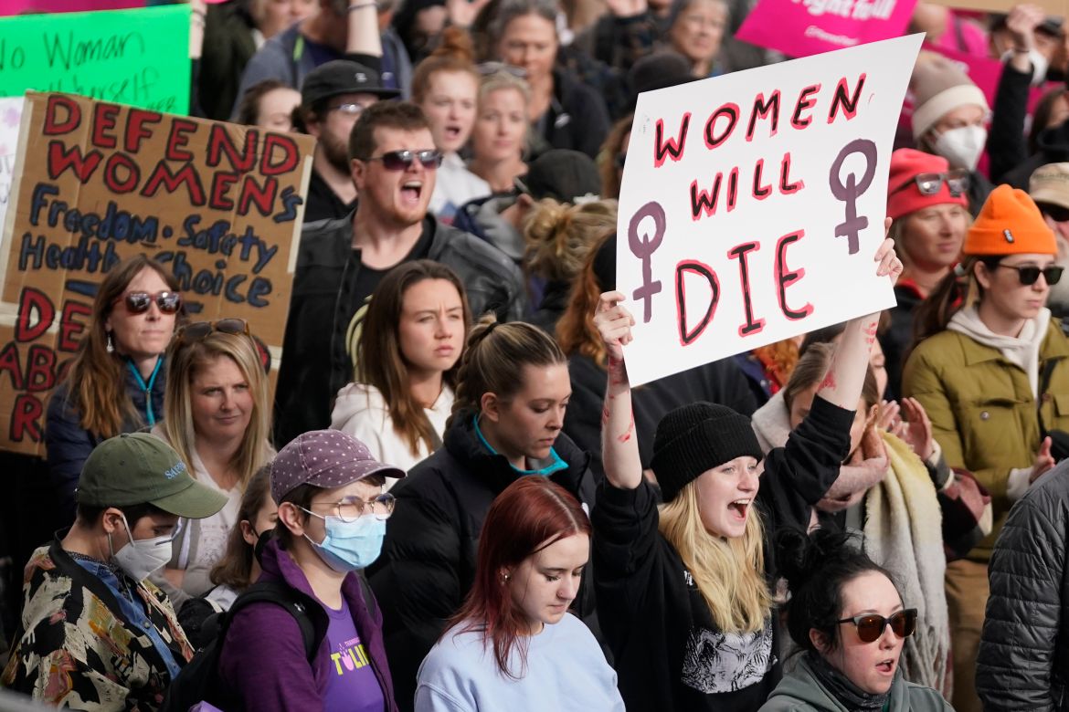 People attend a pro-abortion rights rally at the Utah State Capitol