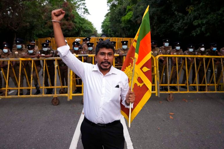 A Sri Lankan man shouts slogans against government