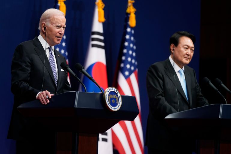 U.S. President Joe Biden, left, speaks as South Korean President Yoon Suk Yeol listens during a news conference at the People's House inside the Ministry of National Defense,