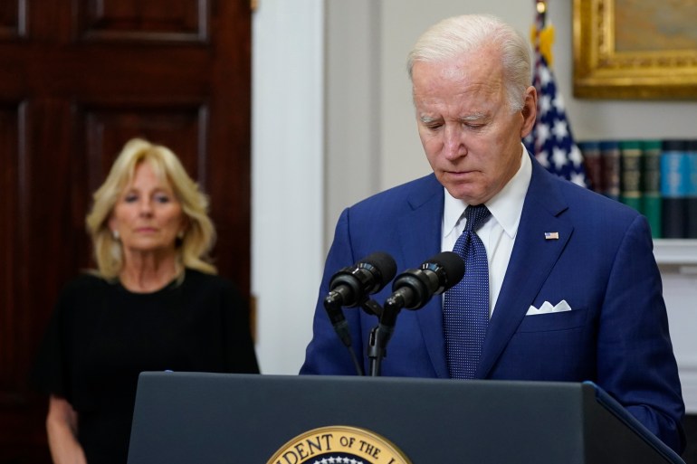 US president Joe Biden addresses the nation with his wife behind him
