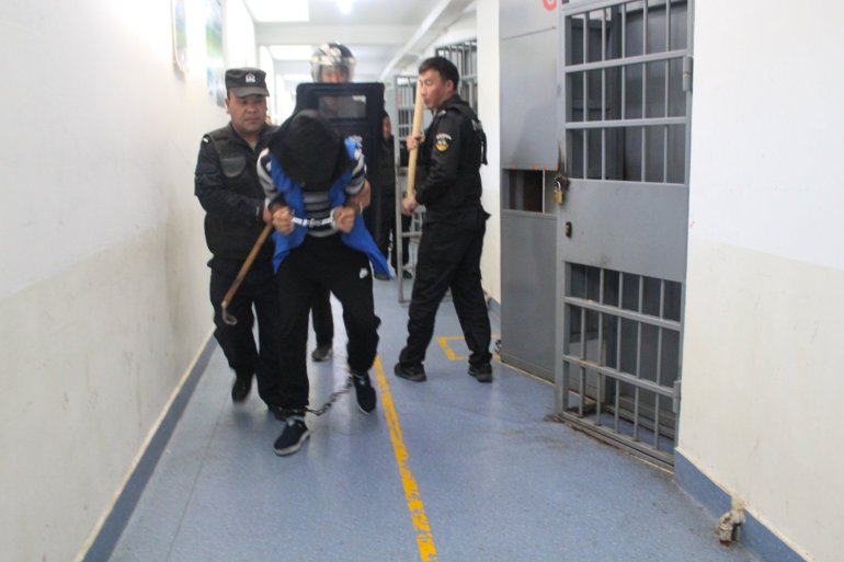 Internment camp police security drills at the Tekes County Detention Center from 2018, taken by the detention center photographer. Photo courtesy of the Xinjiang Police Files project.