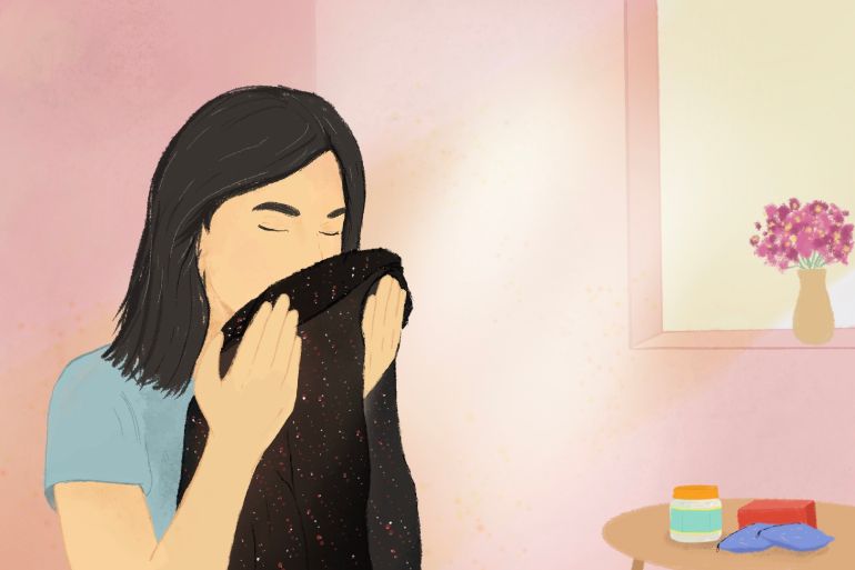 Illustration of a woman smelling a shirt