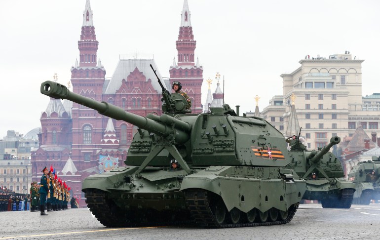 Russian 2S35 Koalitsiya-SV self-propelled howitzers roll toward Red Square during the Victory Day military parade in Moscow, Russia