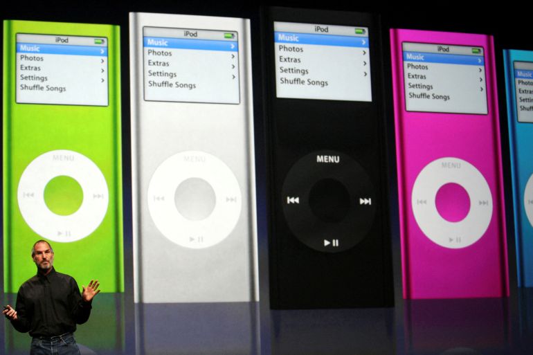 Apple Chief Executive Steve Jobs introduces new iPod Nanos to the crowd at the Yerba Buena Center of the Arts theater in San Francisco, California