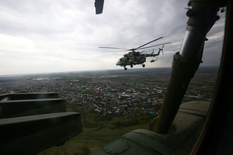 Russian Mi-8 helicopters fly towards Novosibirsk, Russia, in 2020.