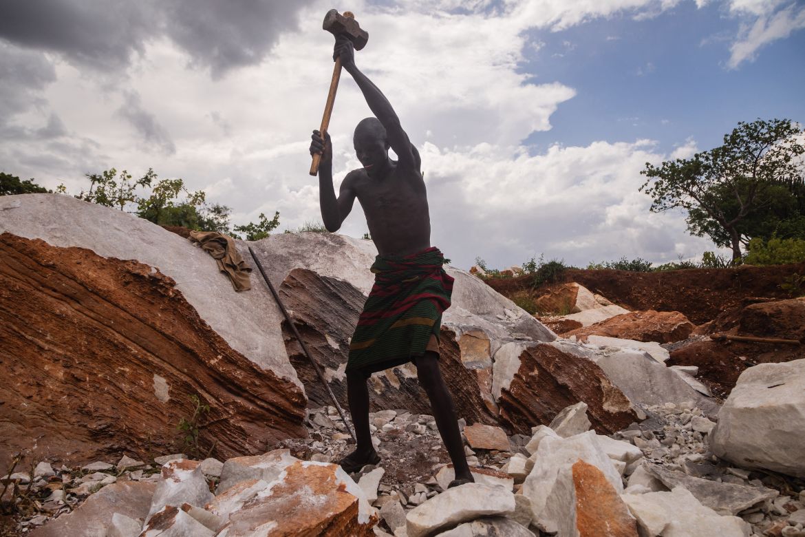 A man works in a marble quarry in Rupa