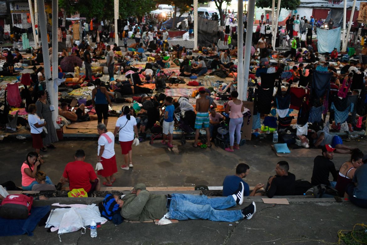 Migrants taking part in a caravan heading to the US, remain at a makeshift camp, in Huixtla