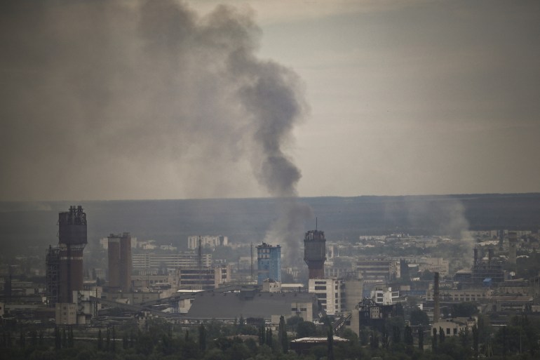 Smoke rises from the city of Severodonetsk in the eastern Ukraine