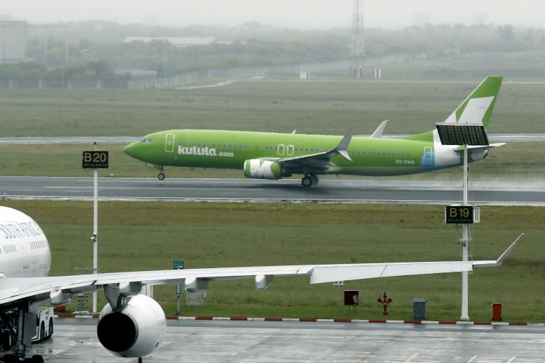 An aircraft from South African low cost airline Kulula taking off.