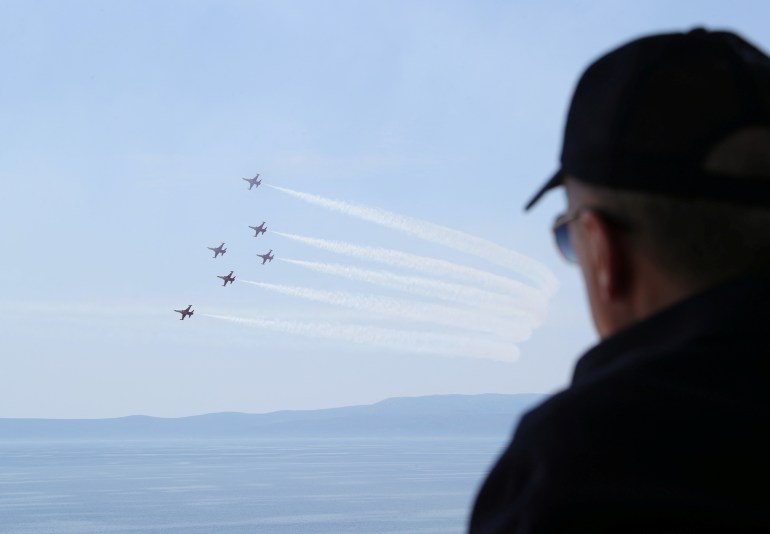Turkish President Recep Tayyip Erdogan is seen watching a military drill near Izmir