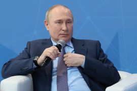 Russia's President Vladimir Putin attends a meeting with Russian young entrepreneurs and specialists ahead of the St. Petersburg International Economic Forum in Moscow