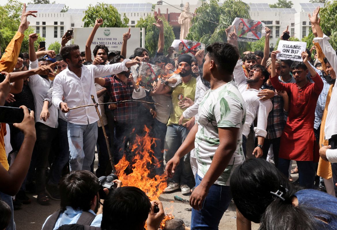 Jamia Millia Islamia university students burn effigies depicting suspended Bharatiya Janata Party (BJP) spokeswoman Nupur Sharma and expelled BJP leader Naveen Jindal, demanding their arrest for their comments on Prophet Mohammed, at Jamia Millia Islamia university in New Delhi