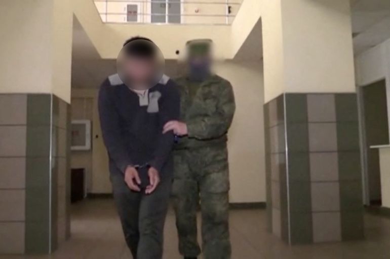 A still image taken from Russian state TV footage purports to show Andy Huynh at an unknown location [Reuters]