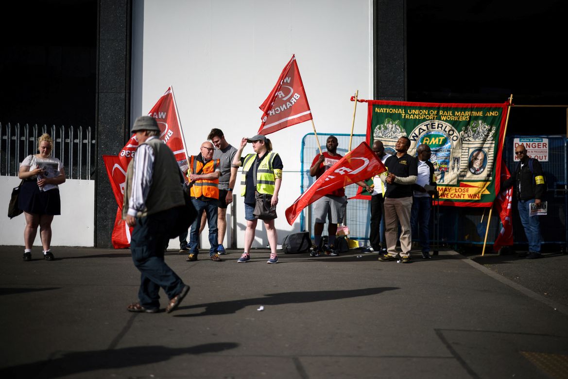 Rail workers strike outside the Waterloo Station