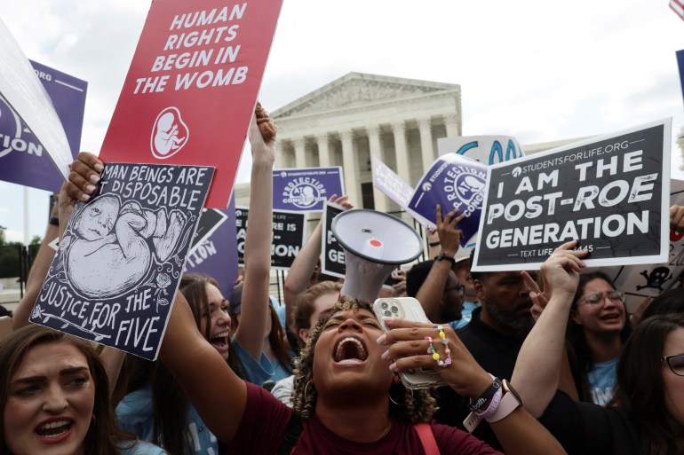 Anti-abortion demonstrators celebrate outside US Supreme Court