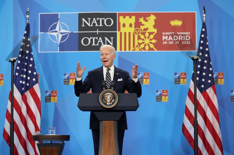 US President Joe Biden is seen addressing reporters at the NATO summit in Madrid