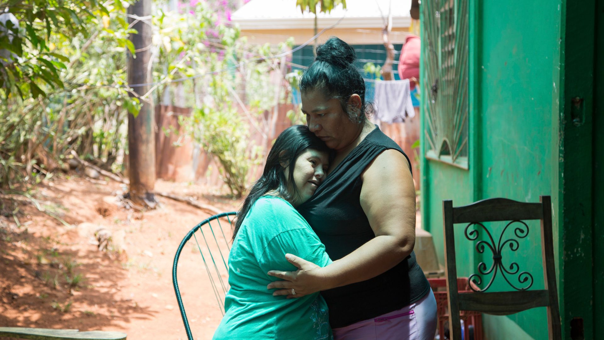 A photo of Mareju Vargas, 46, at her home in Terraba hugging her 42-year-old sister Ana Laura.