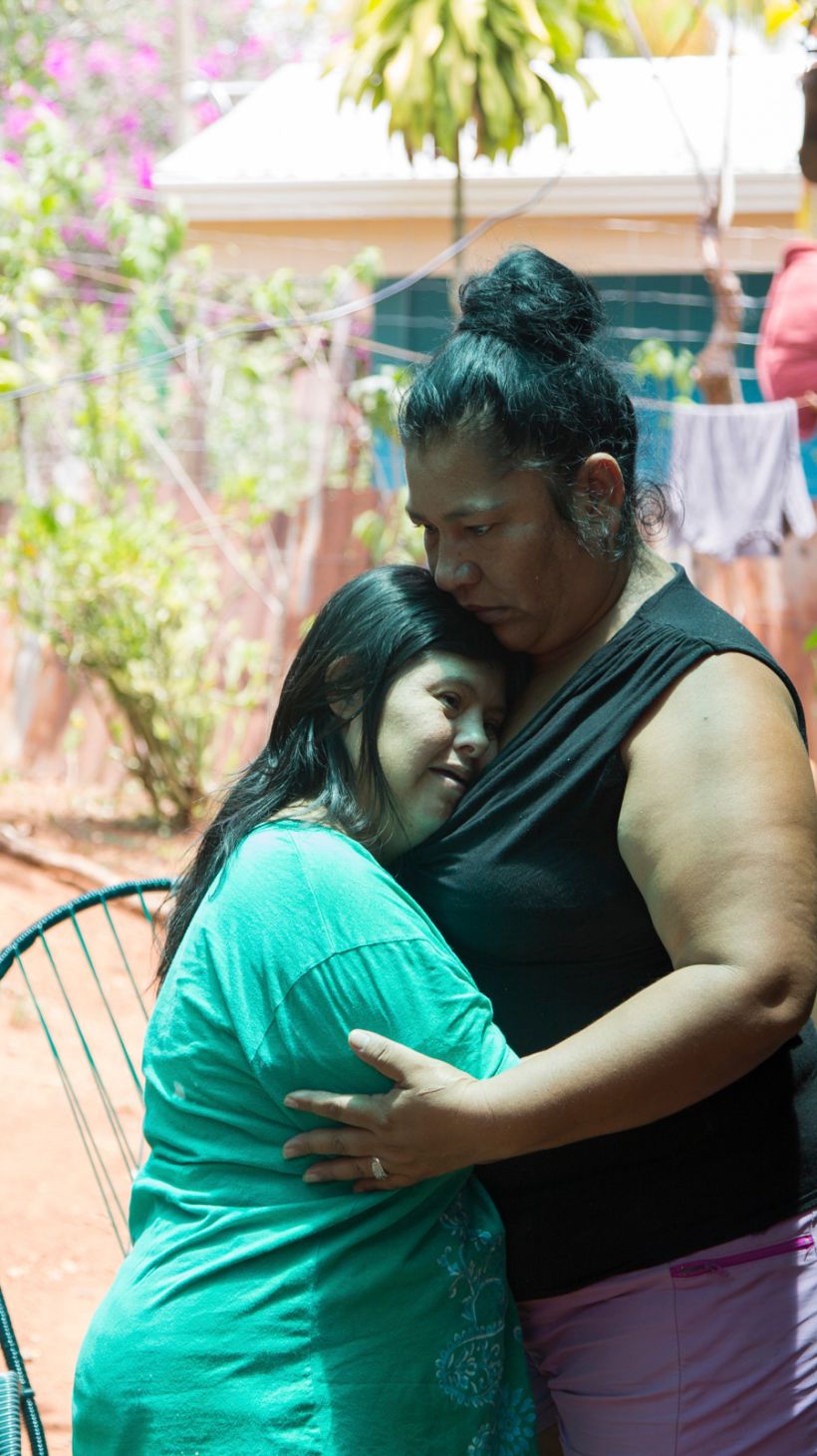 A photo of Mareju Vargas, 46, at her home in Terraba hugging her 42-year-old sister Ana Laura.