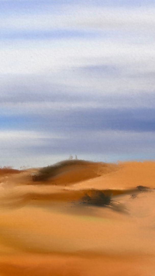 An illustration of a person walking through a desert wearing a red scarf and looking at two little huts and a few little houses among some shrubbery in the distance.