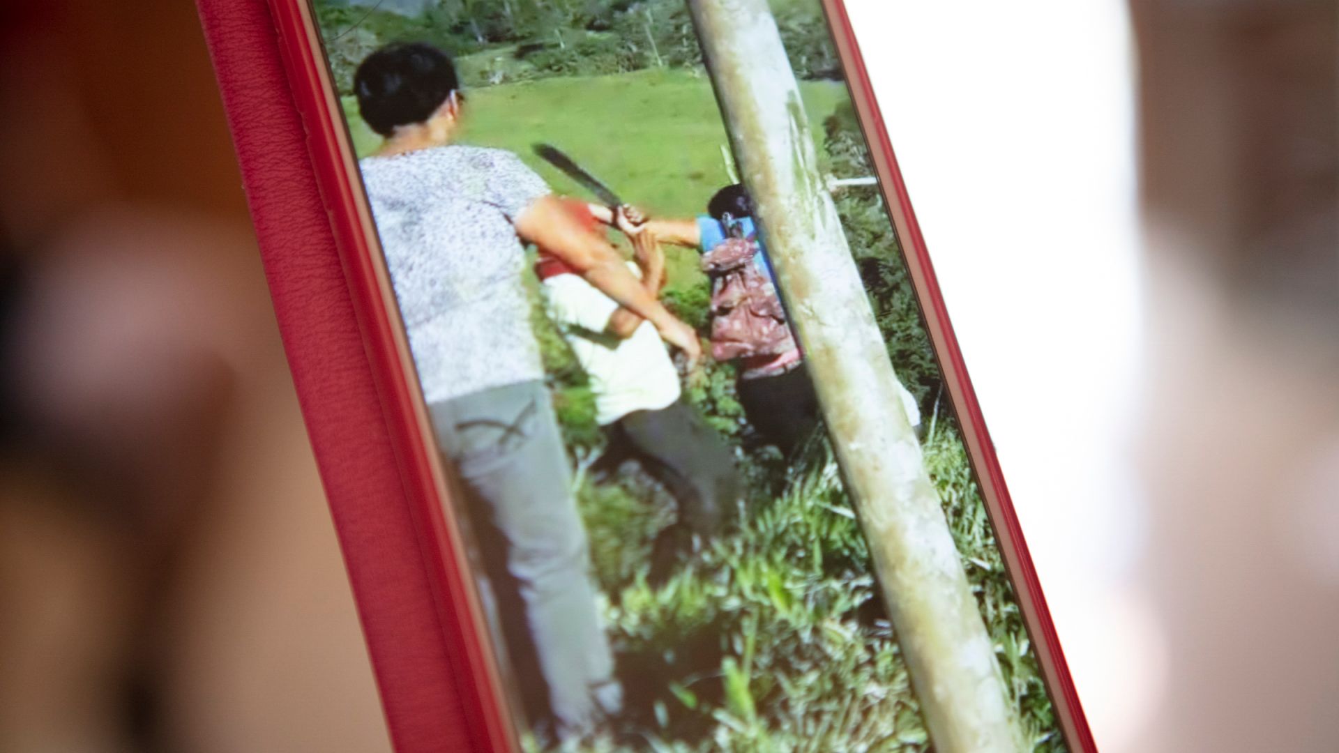 A photo of a close-up detail of a phone recording of an elder under attack during the seizure of Vargas-Cascante’s third farm.
