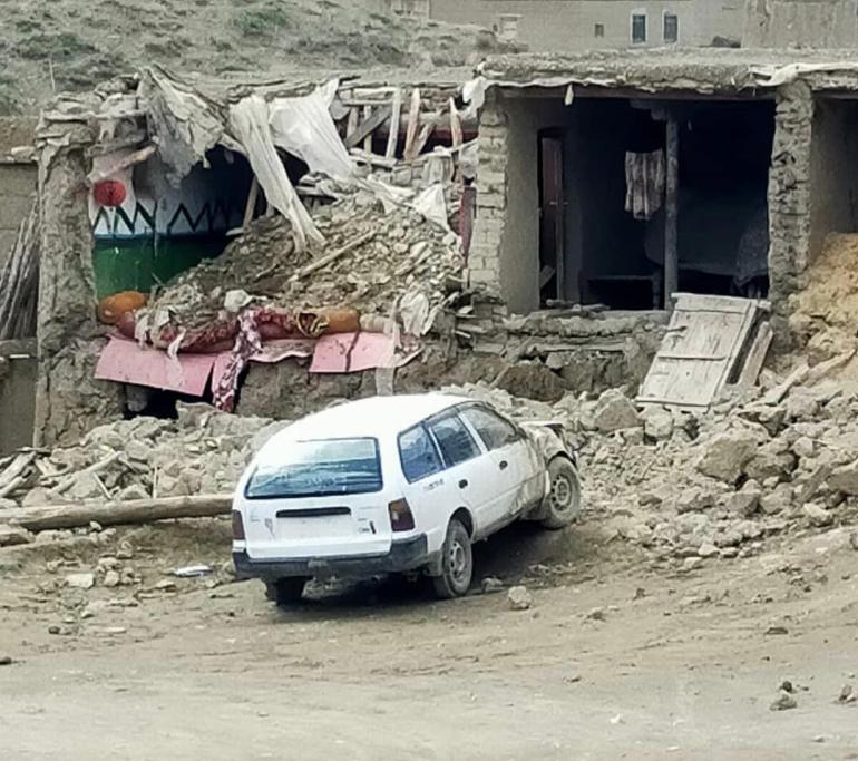 A collapsed home is seen following a powerful earthquake in Afghanistan. 