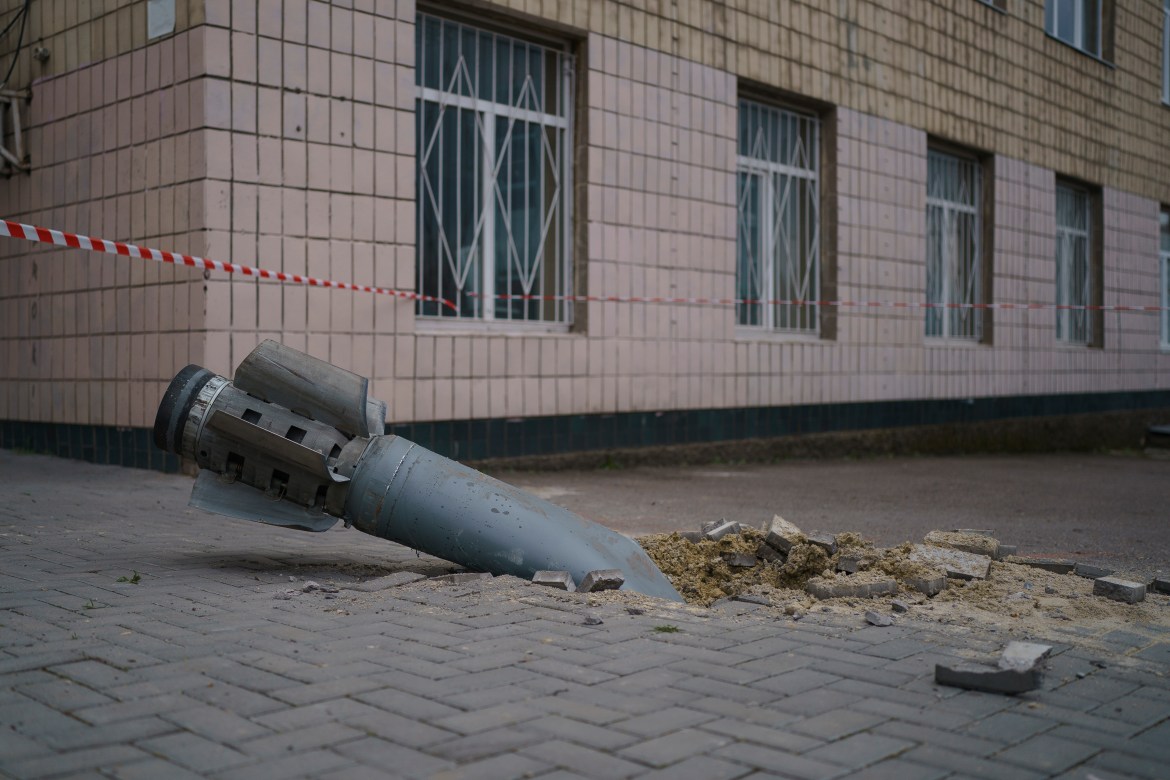 An unexploded missile stuck in the ground in the city centre of Mykolaiv.