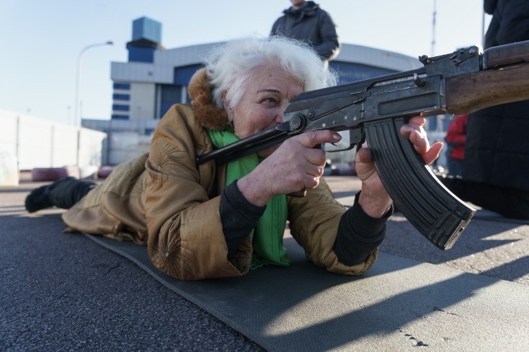 Valentyna Konstantynovska, 79, training for the possible Russian invasion in Mariupol, Ukraine.