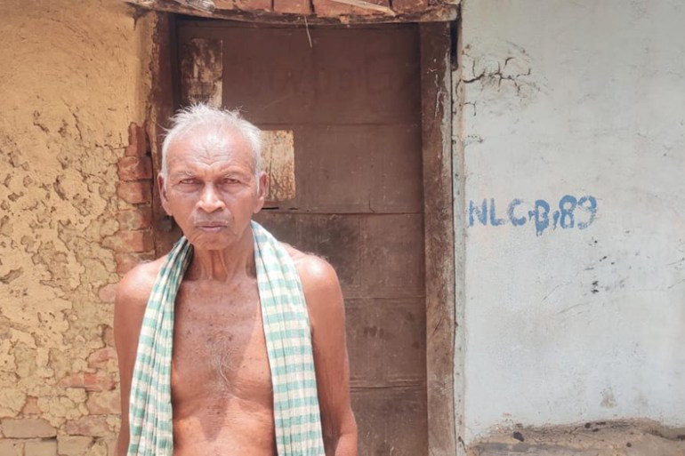 Nityananda Deep standing outside his home which has been marked for demolition