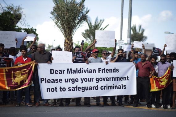 Sri Lankans living in the Maldives stage a demonstration in Male
