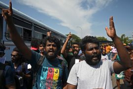 Demonstrators shout slogans against interim Sri Lanka's President Ranil Wickremesinghe during a protest in front of the Fort railway station in Colombo.