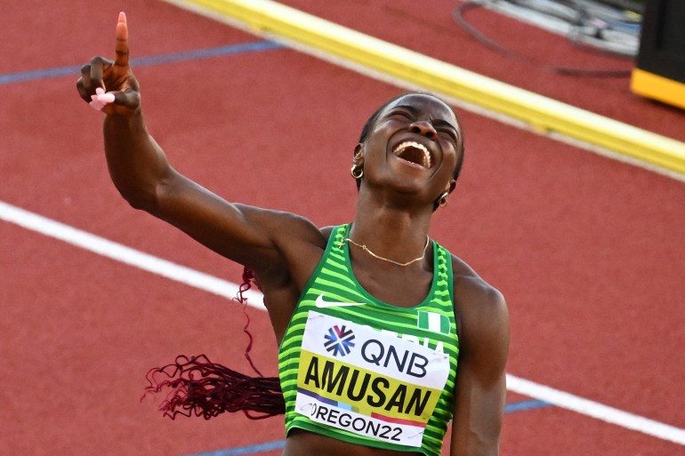 Nigeria's Tobi Amusan reacts after setting a world record in the women's 100m hurdles final during the World Athletics Championships at Hayward Field in Eugene, Oregon on July 24, 2022. (Photo by Jim WATSON / AFP)