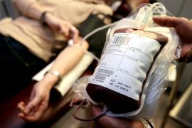 A donor gives blood at a National BlService centre in London