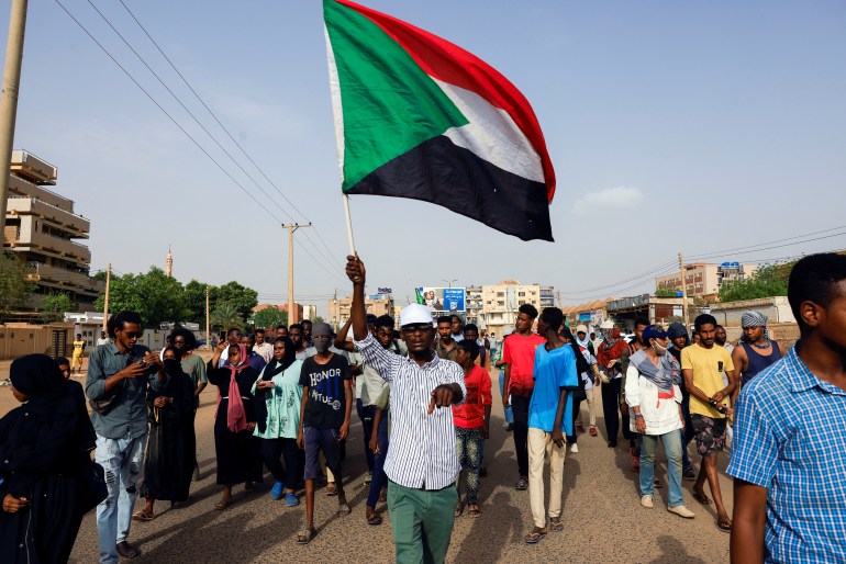 Protesters march in Sudan