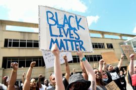 Demonstrators protest against the Akron police shooting death of Black man Jayland Walker in Akron, Ohio, U.S. July 3, 2022. [Gaelen Morse/Reuters]