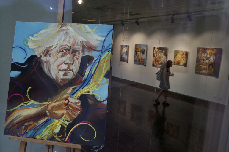 FILE PHOTO: FILE PHOTO: A portrait of British Prime Minister Boris Johnson is seen at a gallery, as Russia?s attack on Ukraine, in Kyiv, Ukraine July 6, 2022. REUTERS/Valentyn Ogirenko/File Photo/File Photo