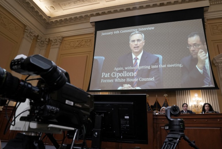 Pat Cipollone's video testimony on a big screen during Tuesday's January 6 hearing.
