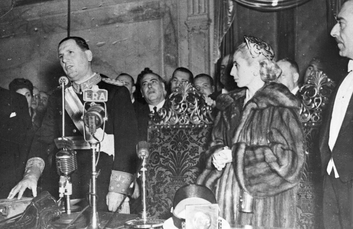 FILE - In this June 4, 1952 file photo, Argentina's first lady Maria Eva Duarte de Peron, known as "Evita," right, watches as her husband, President Juan Peron, as he is sworn-in for his second term as president at Congress in Buenos Aires, Argentina. Argentines commemorate the 60th anniversary of the death of their most famous first lady on Thursday, July 26, 2012. Evita died of cancer on July 26, 1952 at the age of 33. (AP Photo/File)