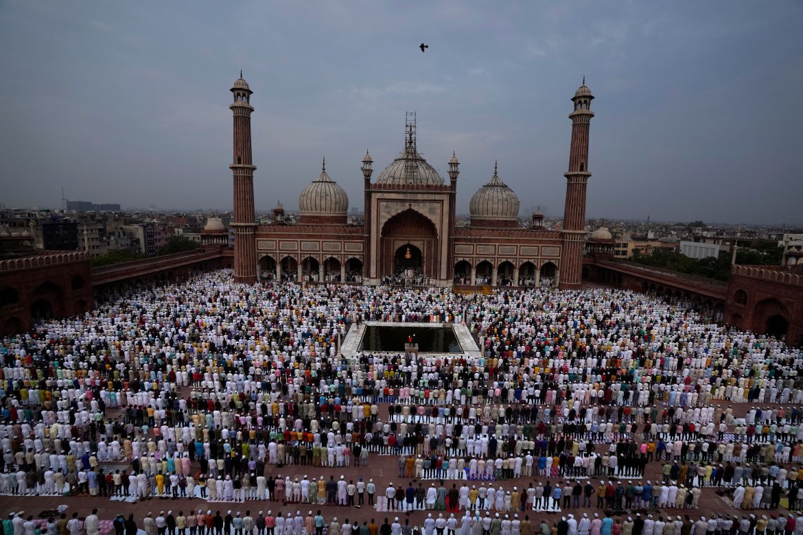 Muslims offer Eid al-Adha prayers at the Jama Masjid, in New Delhi