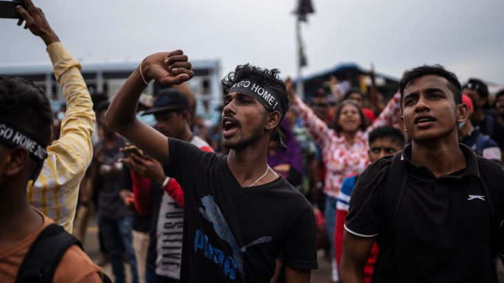 Protesters shout slogans at the protest site in Colombo, Sri Lanka, Monday, July 11, 2022.