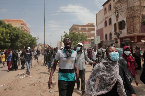 Sudanese demonstrators protest in the streets calling for civilian rule and denouncing the military administration, in Khartoum, Sudan