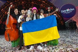 Kalush Orchestra from Ukraine celebrate after winning the Grand Final of the Eurovision Song Contest at Palaolimpico arena, in Turin, Italy, Saturday, May 14, 2022.