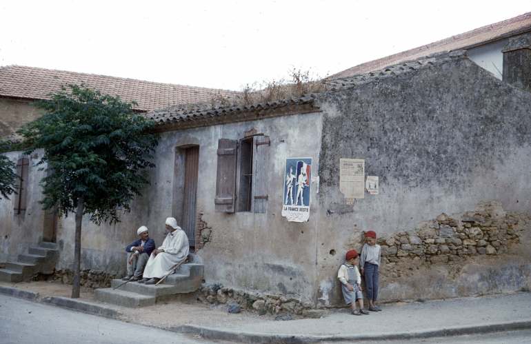 ALGERIA - CIRCA 1958: Algeria. Poster "France stays" on a house. May 1958. (Photo by Roger Viollet via Getty Images/Roger Viollet via Getty Images)